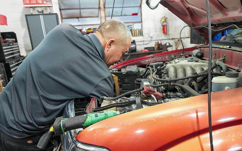 image of ASE certified mechanic working on a vehicle at Masaki's Auto Repair